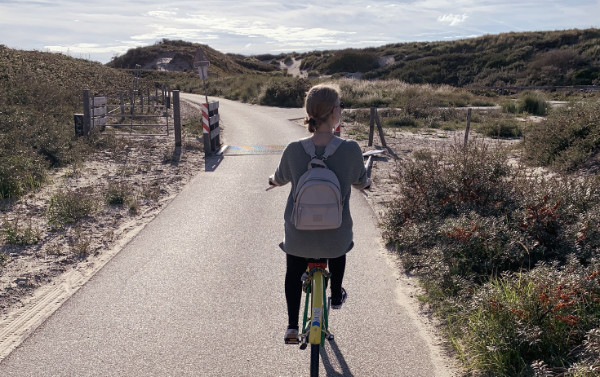 Ines riding a bicycle